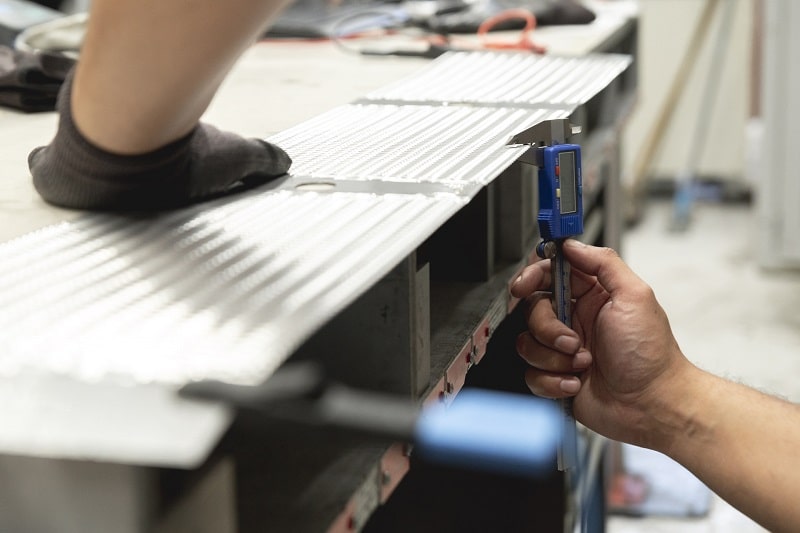 Worker working on MDR metal